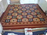 Entrance lobby to ground floor Mansion flat using victorian style tiles, in Brighton.