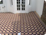 Sun terrace to large Victorian property in Brighton laid using individual geometric shapes.